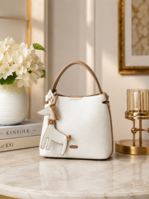 Elegant Ivory & Beige Textured Ladies' Handbag with Decorative Charm