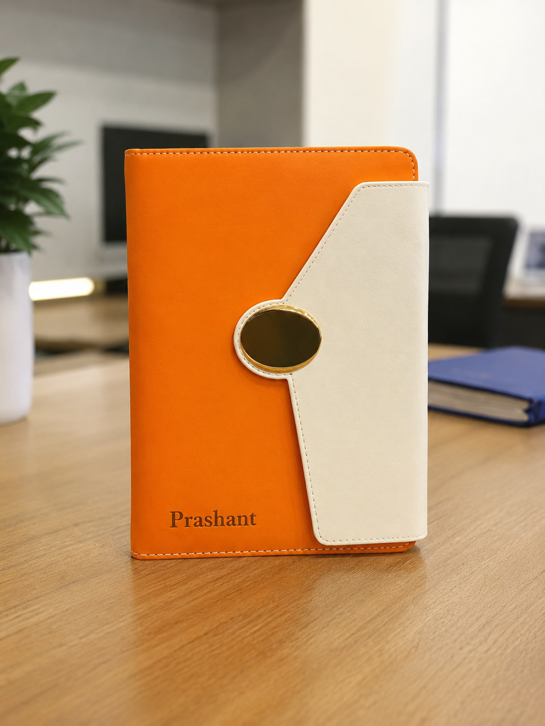 Personalized orange and ivory A5 notebook with magnetic flap closure and custom name